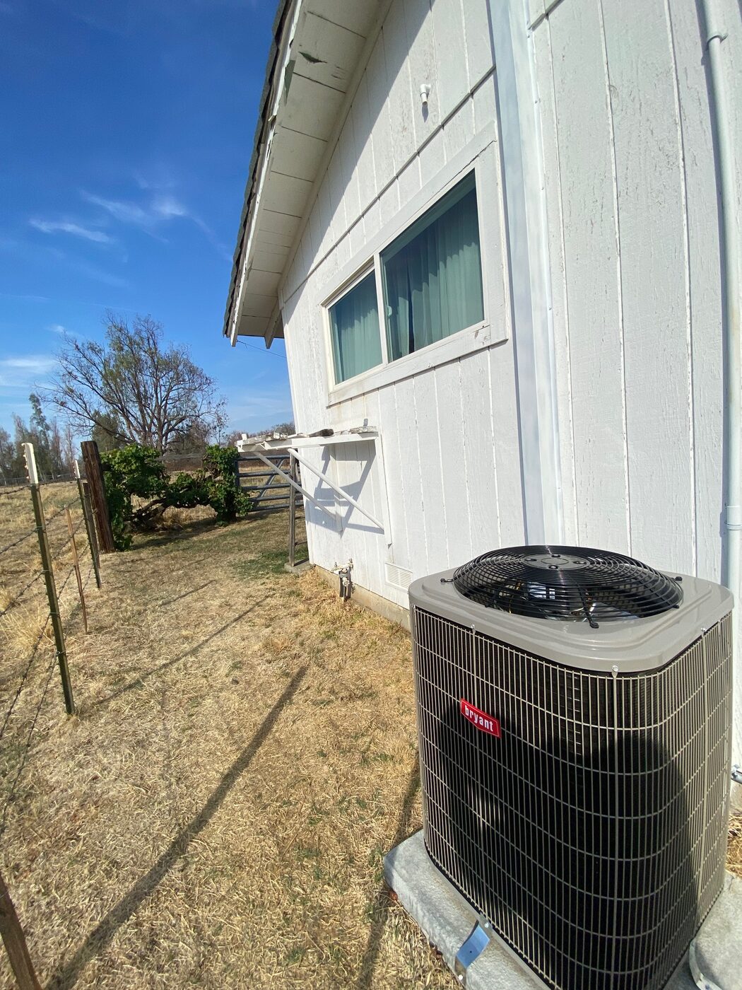 Outdoor AC / heat pump install at a Northern California home
