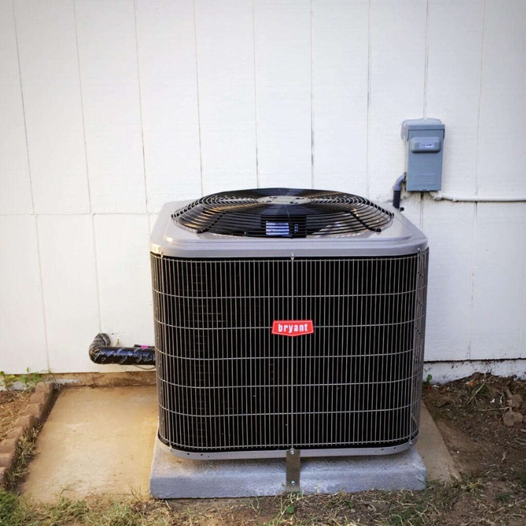 Tidy outdoor condenser installation
